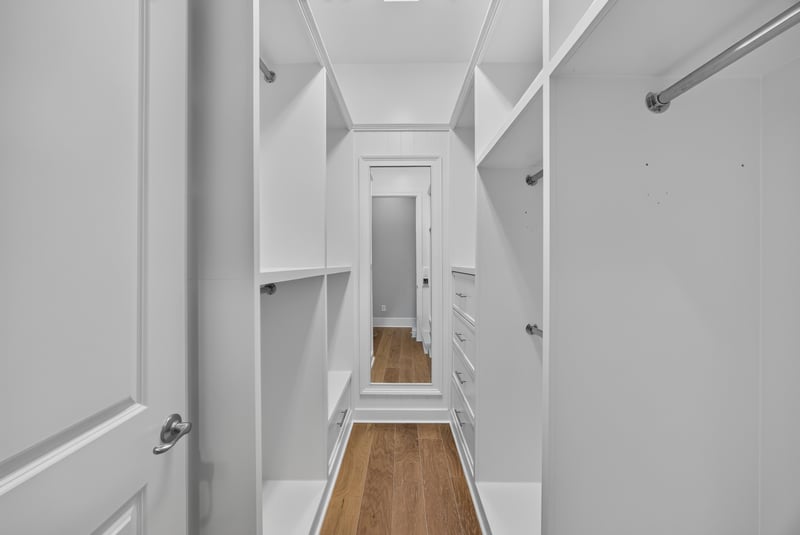 Primary closet with built-in shelving at 186 Freshwater Dr