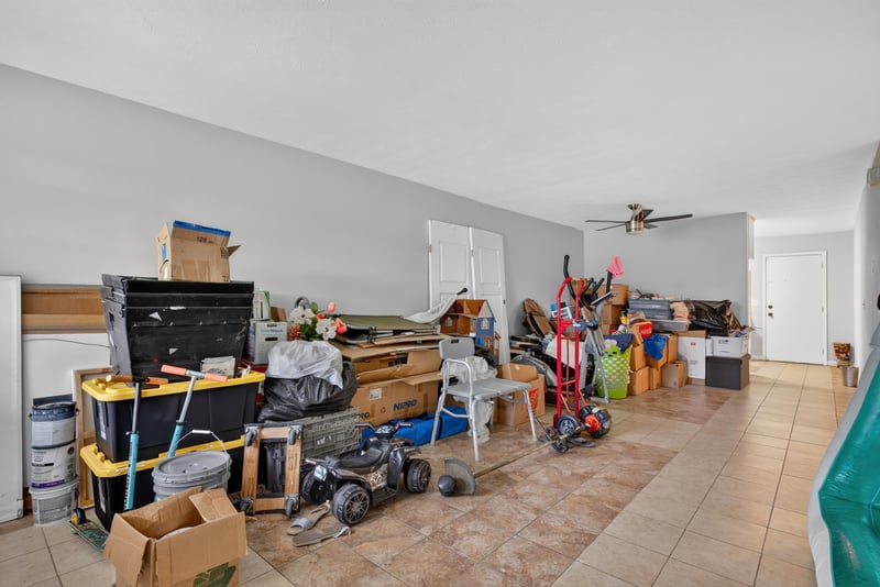 Room with hardwood floor and storage boxes at 5745 110th St, Jacksonville, FL 32244
