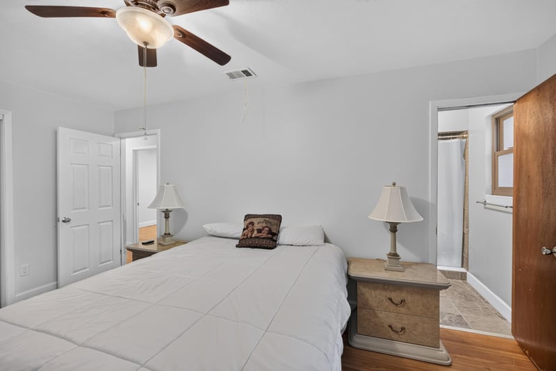 Bedroom with nightstand lamp and ceiling fan at 1847 Grove Park Dr, Orange Park, FL
