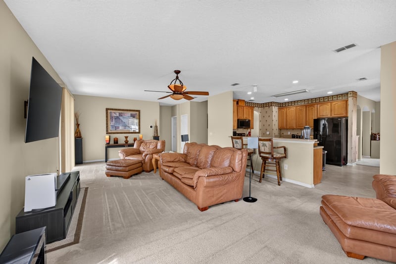 Family room open to the kitchen at 2875 Pebblewood Ln, Orange Park, FL 32065