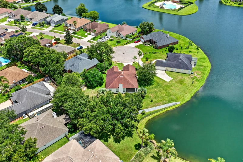 Aerial view of a lakefront neighborhood in Windsor Chase