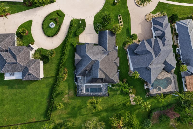 Aerial view of driveway and landscaping at 2304 Spring Hill Ct, Orange Park, FL
