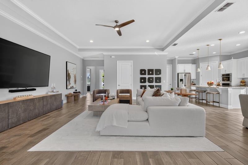 Living room view toward the open kitchen at 3328 Southern Oaks Dr, Green Cove Springs, FL 32043