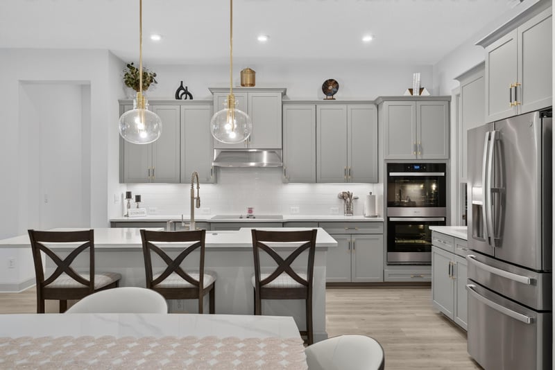 Kitchen island with pendant lights and bar seating at 785 Back Creek Dr, St. Augustine, FL 32092