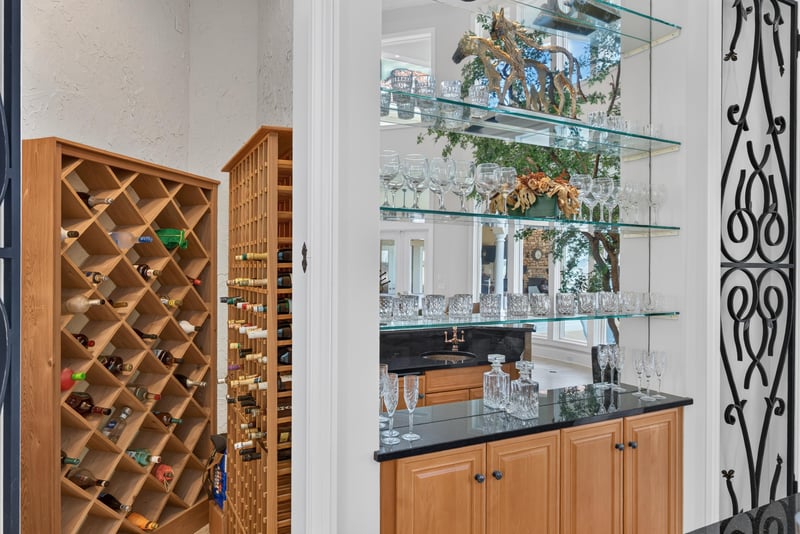 Wine storage with glass display shelves at 344 Broward Rd, Jacksonville, FL