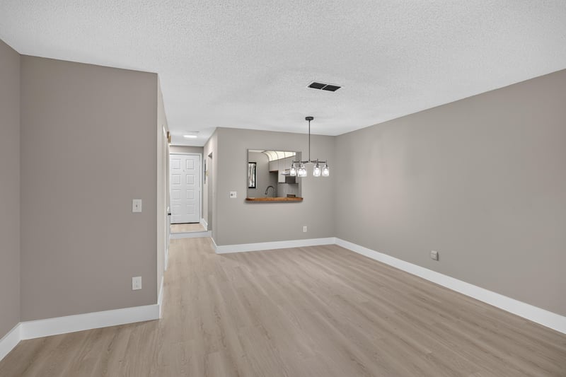 Entry hallway leading to dining area at 3801 Crown Point Rd, Jacksonville, FL 32257