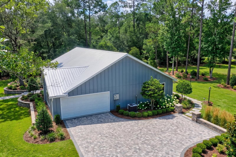 Aerial view of home, driveway, and yard at 4800 Acacia St, Middleburg, FL 32068