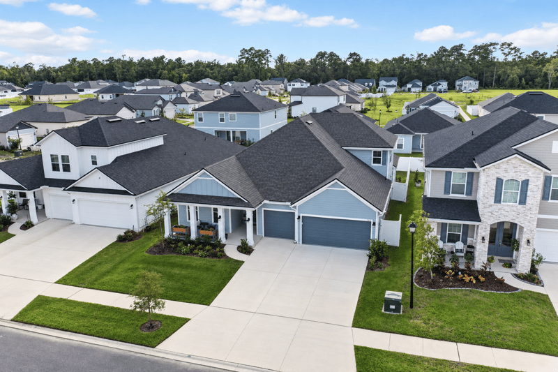 Aerial view of the street with sidewalks and landscaped yards in Middleburg, FL