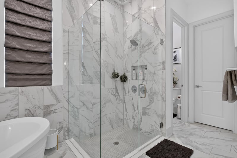 Primary bathroom vanity and walk-in shower at 785 Back Creek Dr, St. Augustine, FL 32092
