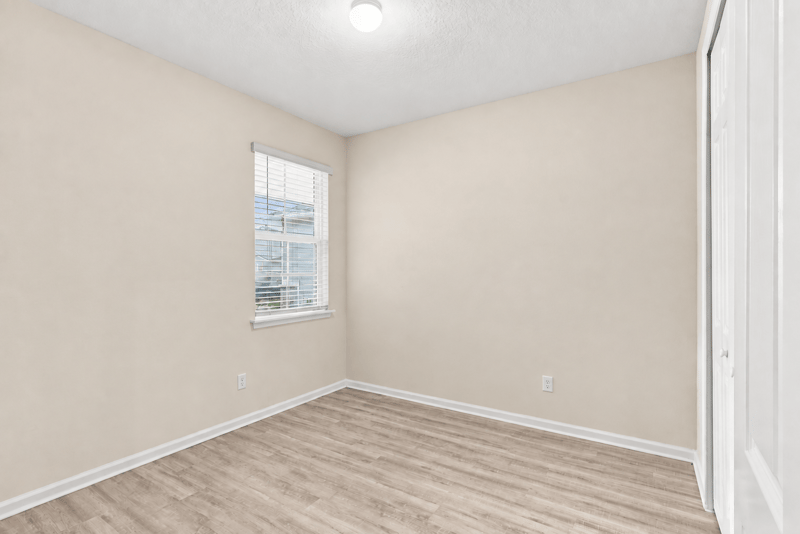Bedroom with single window at 7088 Mahogany Run Dr, Jacksonville, FL 32244