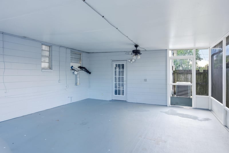 Unfinished garage interior at 417 Capricorn Ln, Orange Park, FL 32073