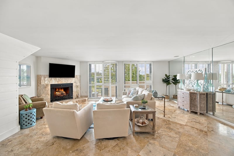 Living room seating area with fireplace at 752 Spinnakers Reach Dr, Ponte Vedra Beach, FL 32082