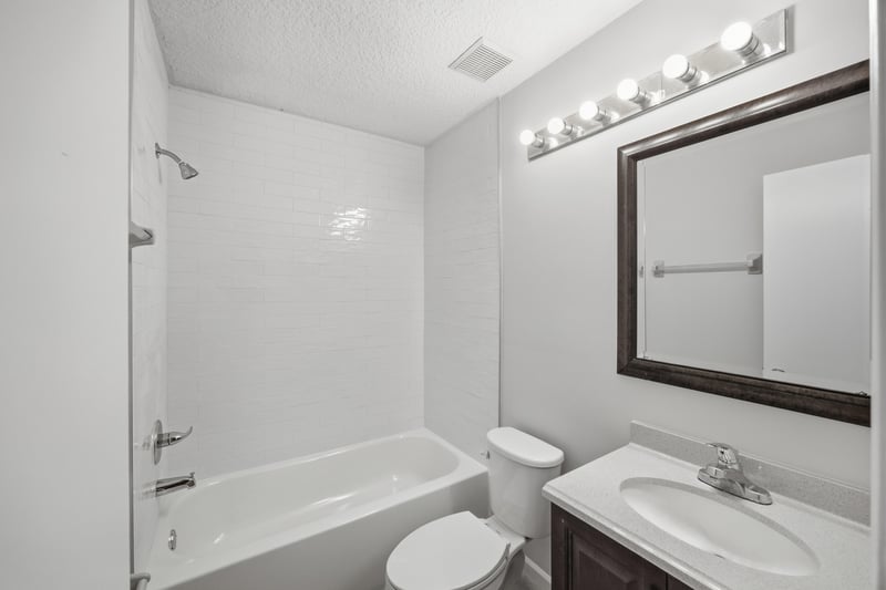 Bathroom with tub and shower combo at 678 5th Ave N, Jacksonville Beach, FL 32250