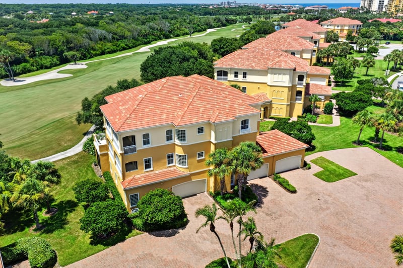 Aerial of the home bordering the golf course at 140 Ave De La Mer, Palm Coast, FL 32137