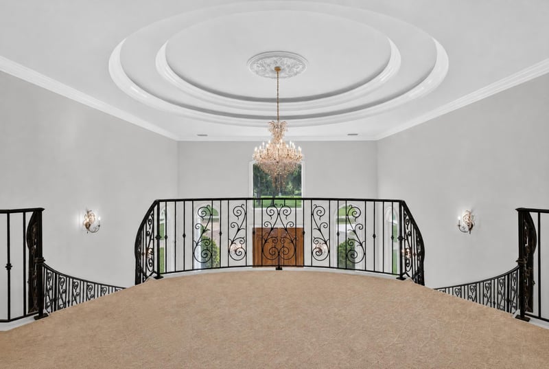 Upstairs landing overlooking the foyer staircases at 344 Broward Rd, Jacksonville, FL