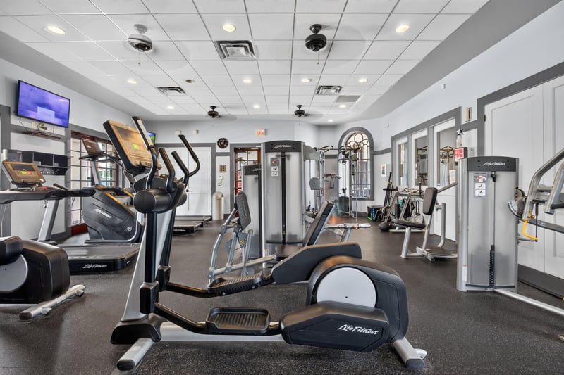 Clubhouse fitness center with cardio equipment in Murabella