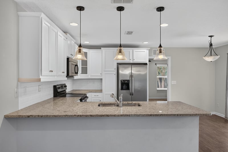 Kitchen counter with pendant lights at 1002 Ingleside Ave, Jacksonville, FL 32205