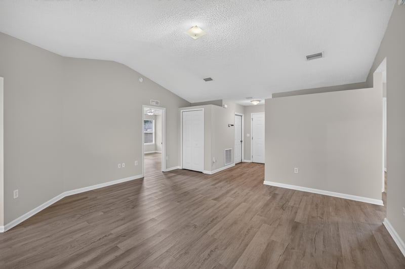 Open living area with wood flooring at 8519 Blazing Star Ct, Jacksonville, FL 32210