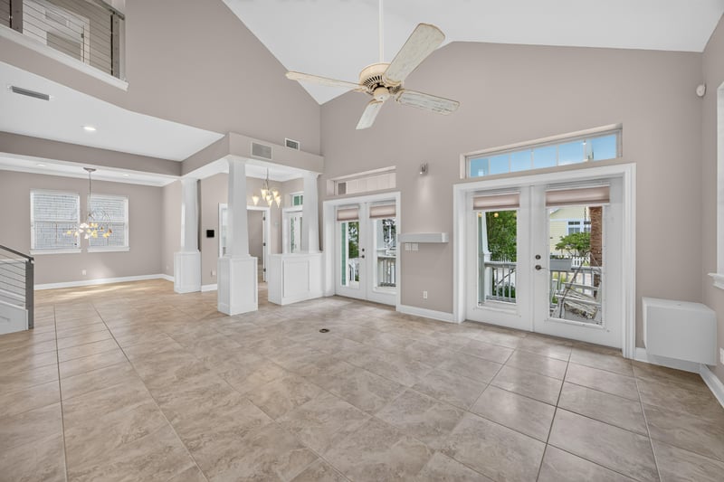 Living area with tray ceiling at 117 Island Cottage Way, St. Augustine, FL 32080