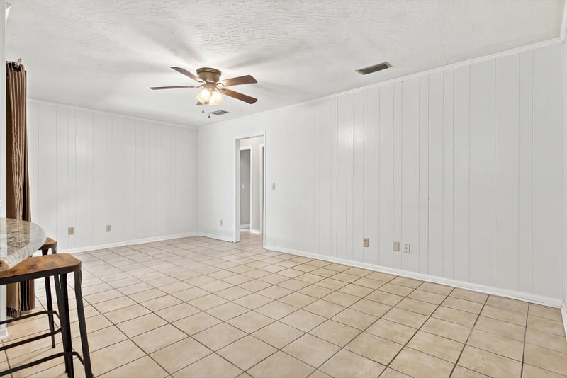 Bonus room interior view with tile flooring, photographed by Megapixeler on Crosby Ln, Orange Park