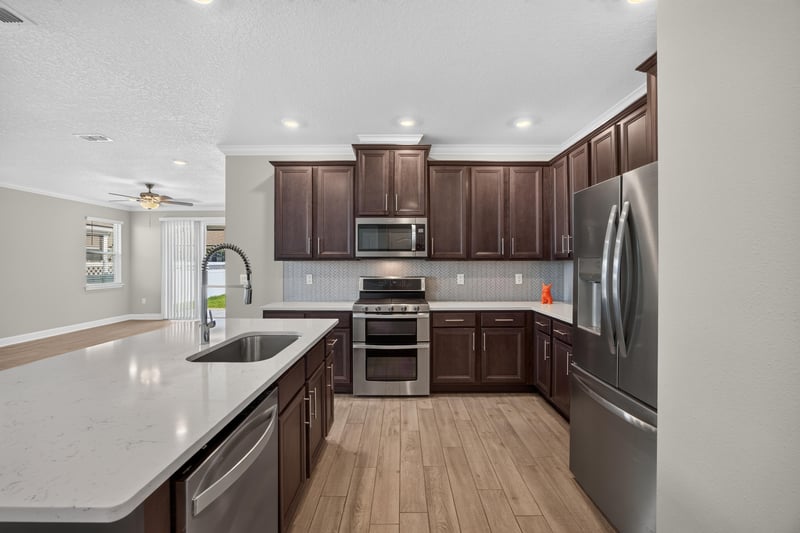 Kitchen with double wall ovens at 331 Millerstone Dr, St. Augustine, FL 32092