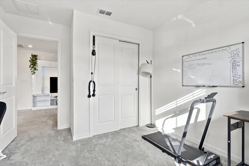 Flex room with workout equipment, photographed by Megapixeler on Torres Trace, St. Augustine