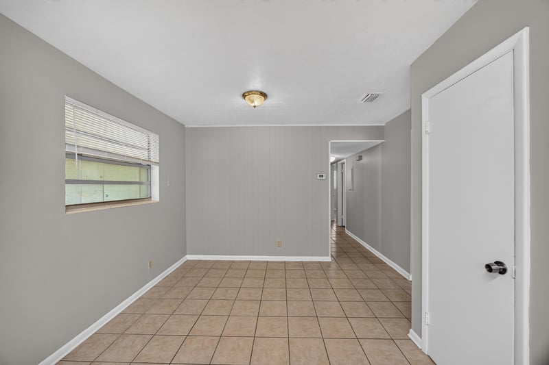 Dining area with tile flooring and window at 5527 Beney Rd, Jacksonville, FL 32207