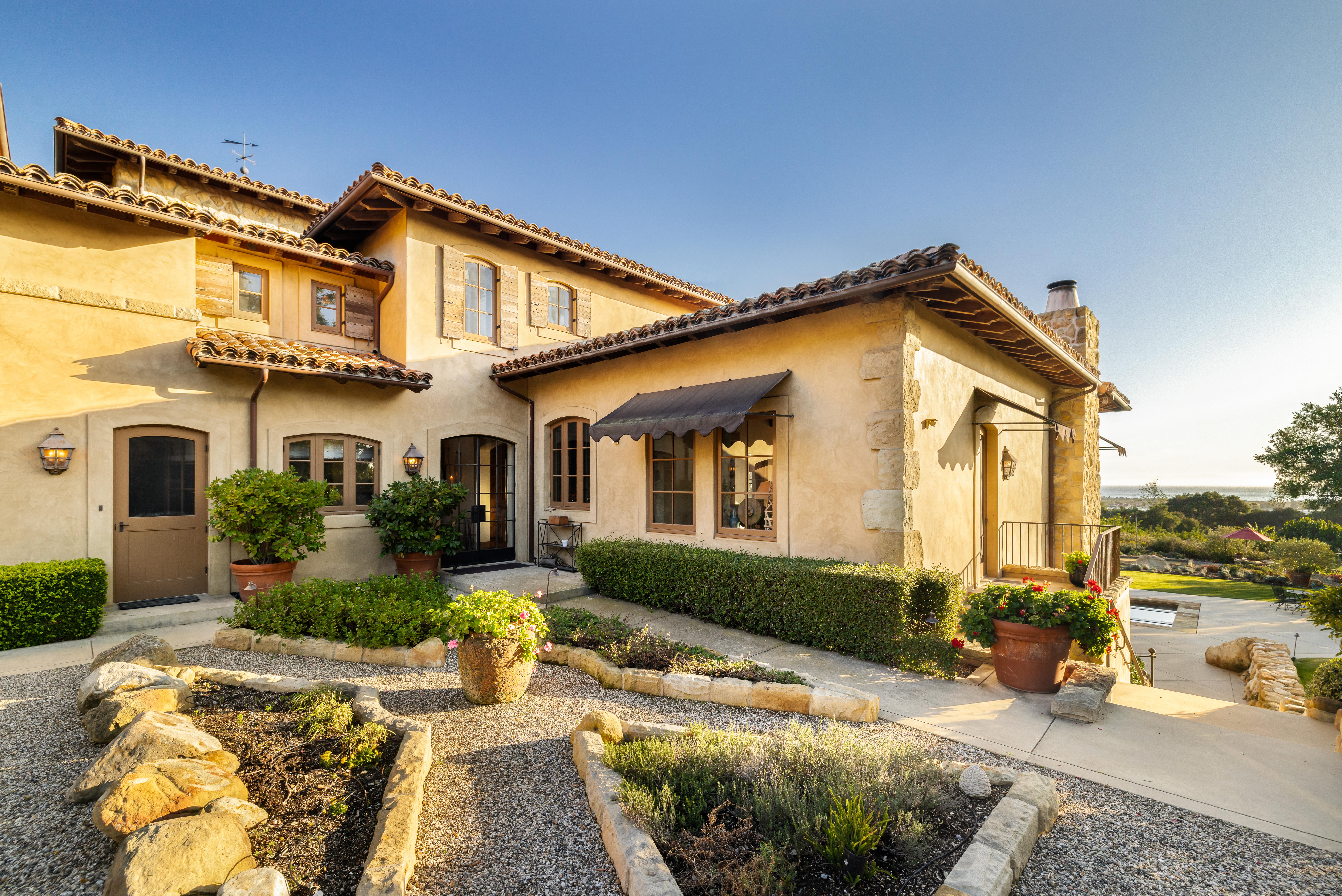 Real estate drone photography showcasing the Montecito foothills and Santa Ynez Mountain backdrop visible from 1915 Monte Alegre Dr, Carpinteria — a rare Southern California estate of singular proportion and presence. Our team captured editorial photography, aerial drone photography via Inspire 3 Cinema Drone, a cinematic property video, a true vertical social media reel, and twilight photography from midday through twilight.