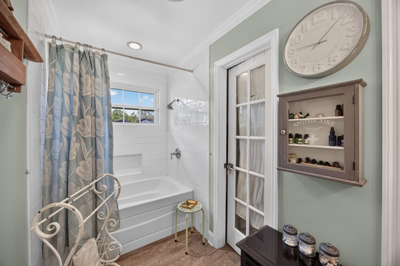 Primary bathroom with soaking tub and window at 4556 Shaky Leaf Ln N, Jacksonville, FL 32224