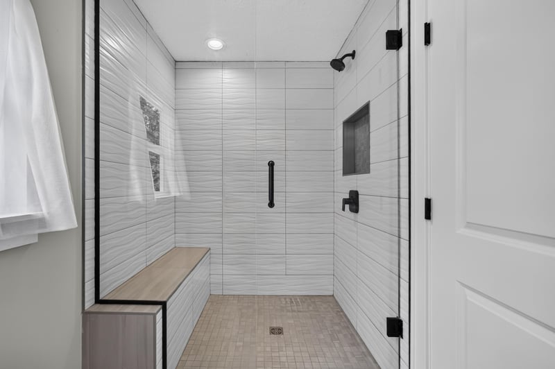 Bathroom with toilet and window at 1161 Whispering Pines Rd, Jacksonville, FL 32259