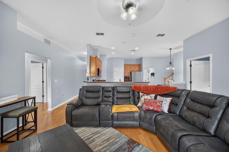 Family room seating with view toward kitchen at 3112 Silverado Cir, Green Cove Springs, FL 32043