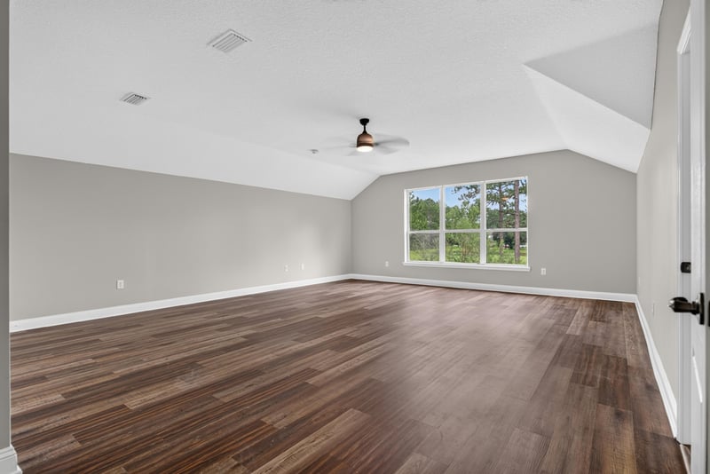 Bedroom with wood floor and ceiling fan at 4109 Eagle Landing Pkwy, Orange Park, FL 32065