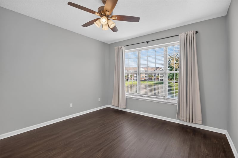 Bedroom with window and drapes at 11251 Campfield Dr unit 4209, Jacksonville, FL 32256