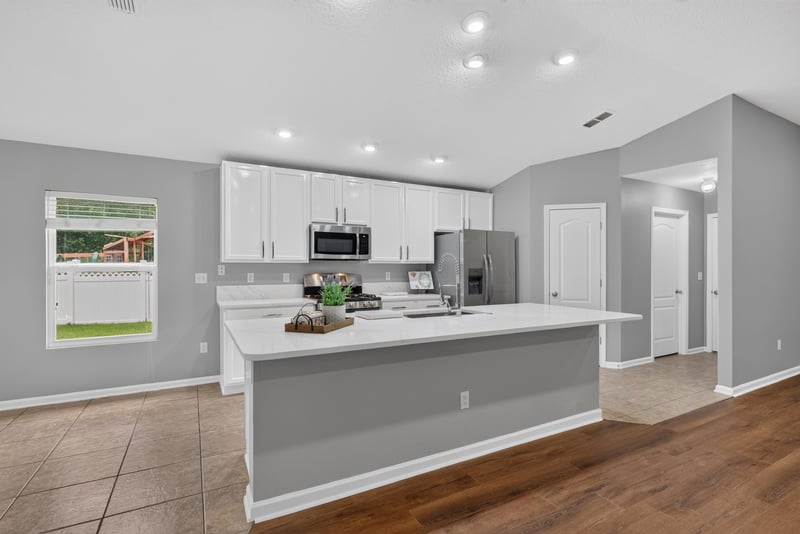 Kitchen with stainless appliances and island at 706 Grampian Highlands Dr, St. Johns, FL 32259