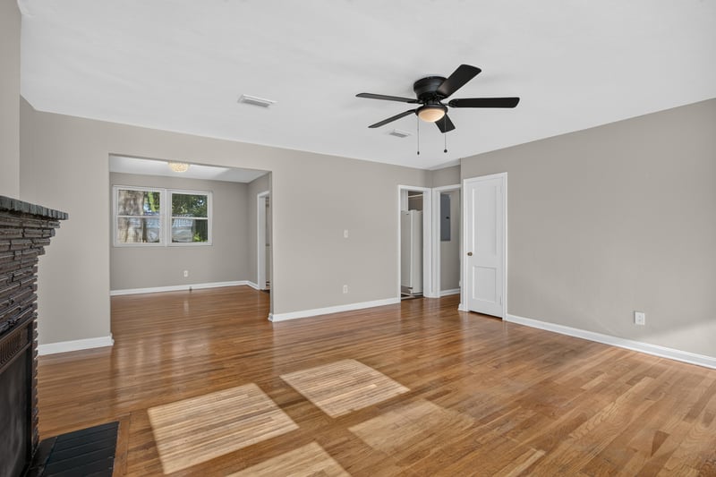 Open living and dining area with hardwood floors at 6338 Mercer Cir W, Jacksonville, FL