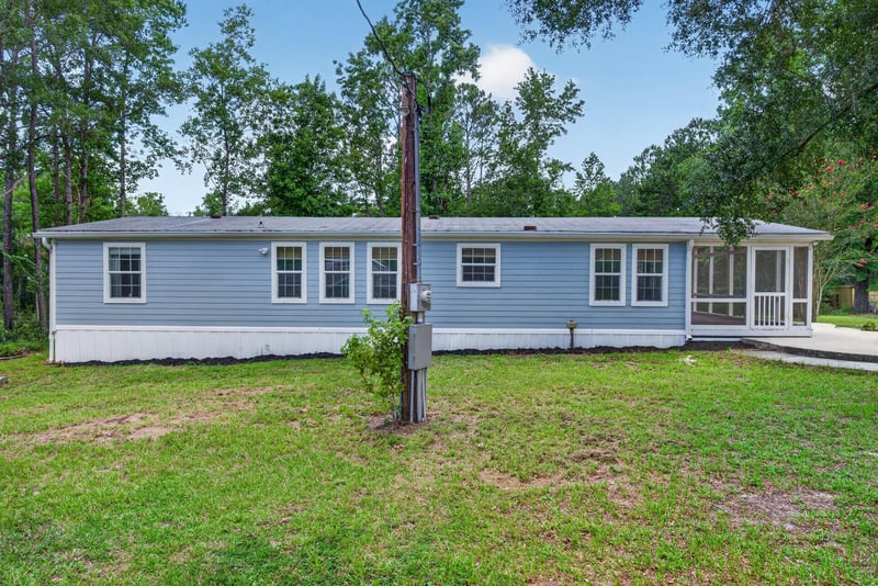 Front exterior view of home with utility pole at 4890 McAllister Rd, Middleburg, FL 32068