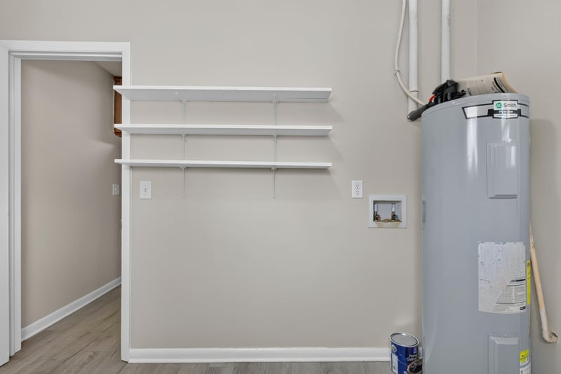 Closet with shelving and water heater at 5503 Boeing Dr, Jacksonville, FL 32207