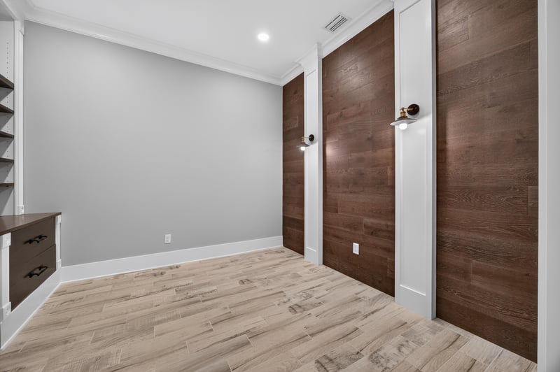 Hallway with dark wood doors at 186 Freshwater Dr