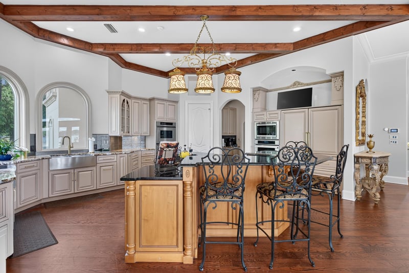 Kitchen with arched windows and chandelier at 344 Broward Rd, Jacksonville, FL