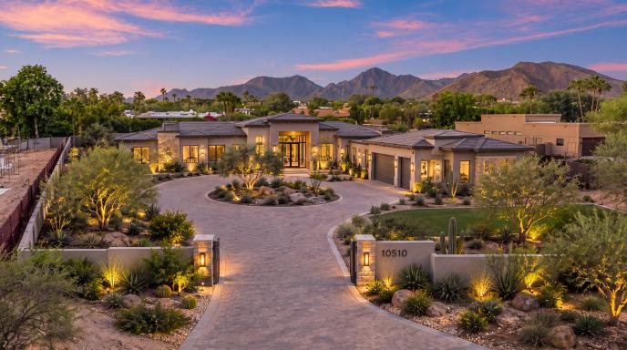 Front of an empty lot at dusk, AI rendering of the finished home