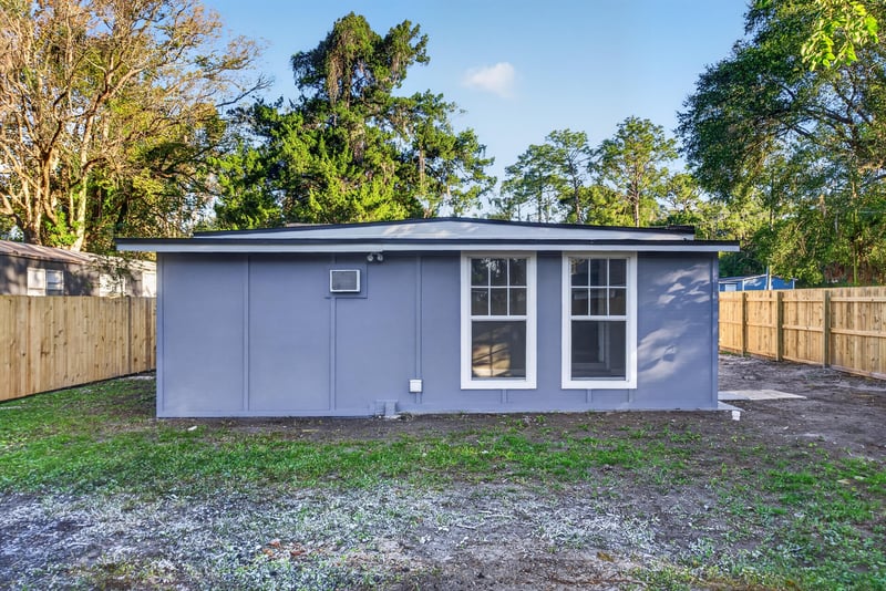 Backyard exterior view of the home, photographed by Megapixeler on Susie St, Jacksonville
