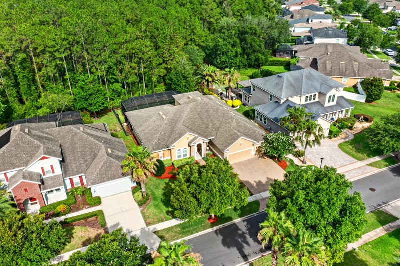 Aerial view of home and street from above at 276 Cross Ridge Dr, Ponte Vedra Beach, FL 32081