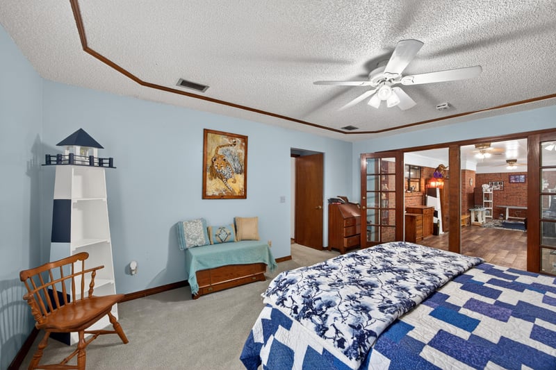 Bedroom with coastal decor and carpet flooring at 981 Marble Ridge Dr, Orange Park, FL 32065