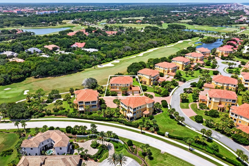 Aerial of winding road through golf course community in Palm Coast, FL