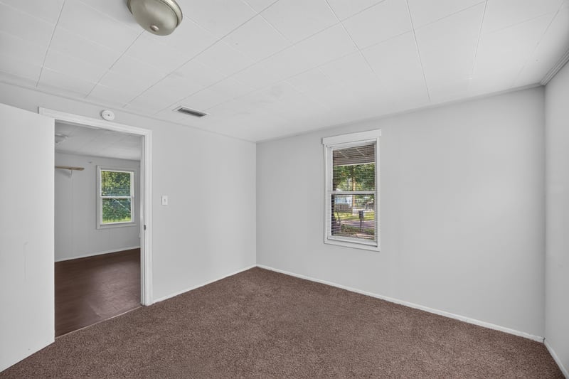 Bedroom with carpet and closet door at 2372 2nd Ave, Jacksonville, FL 32208