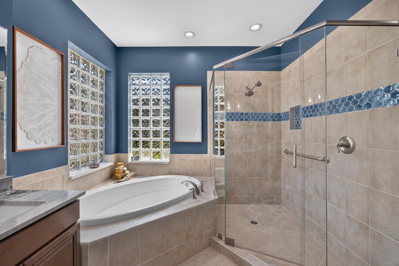 Primary bathroom with soaking tub and glass shower at 140 Ave De La Mer, Palm Coast, FL 32137
