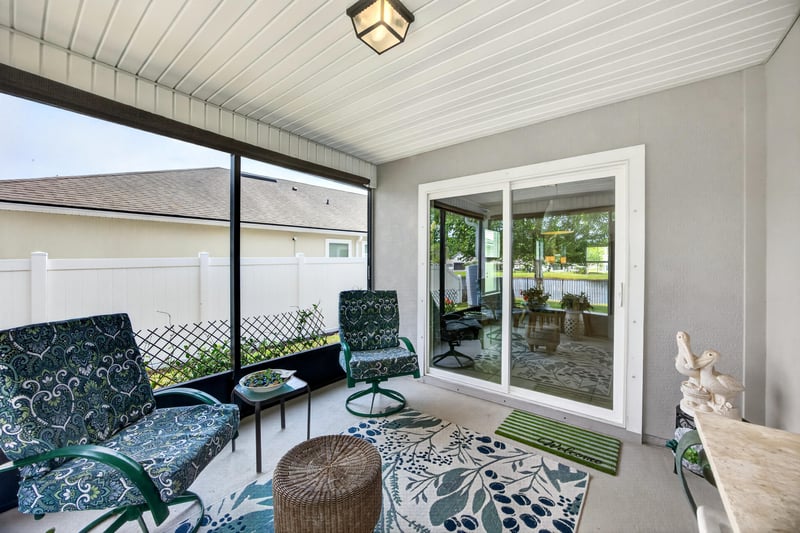 Screened lanai with sliding glass doors at 85 Amia Dr, St. Augustine, FL 32086