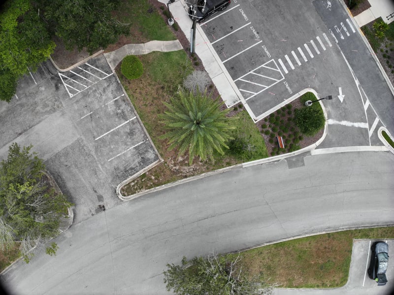 Aerial view of drive and landscaped corner at 9406 Atlantic Blvd, Jacksonville, FL 32225