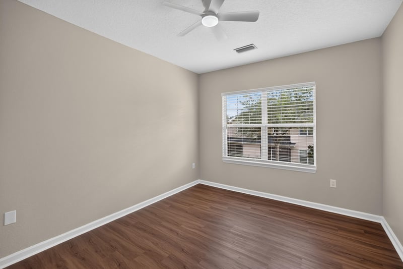 Bedroom with window and ceiling fan at 3750 Silver Bluff Blvd, Orange Park, FL