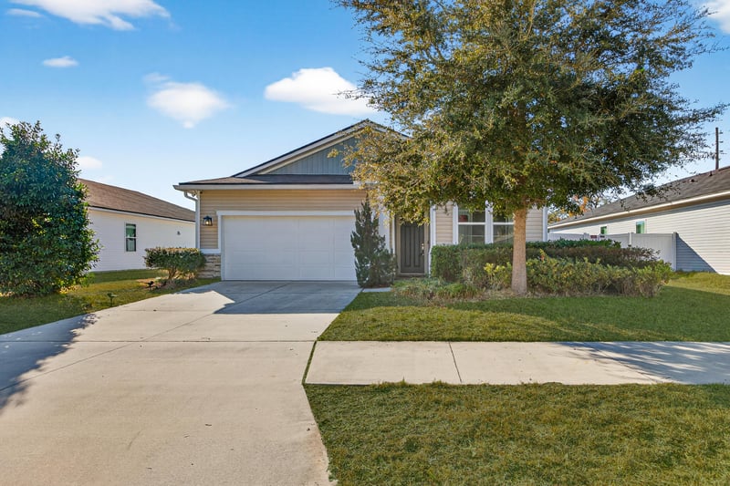 Front Showing Driveway - Grass Enhanced at 6308 Thatcher, Jacksonville, FL 32222